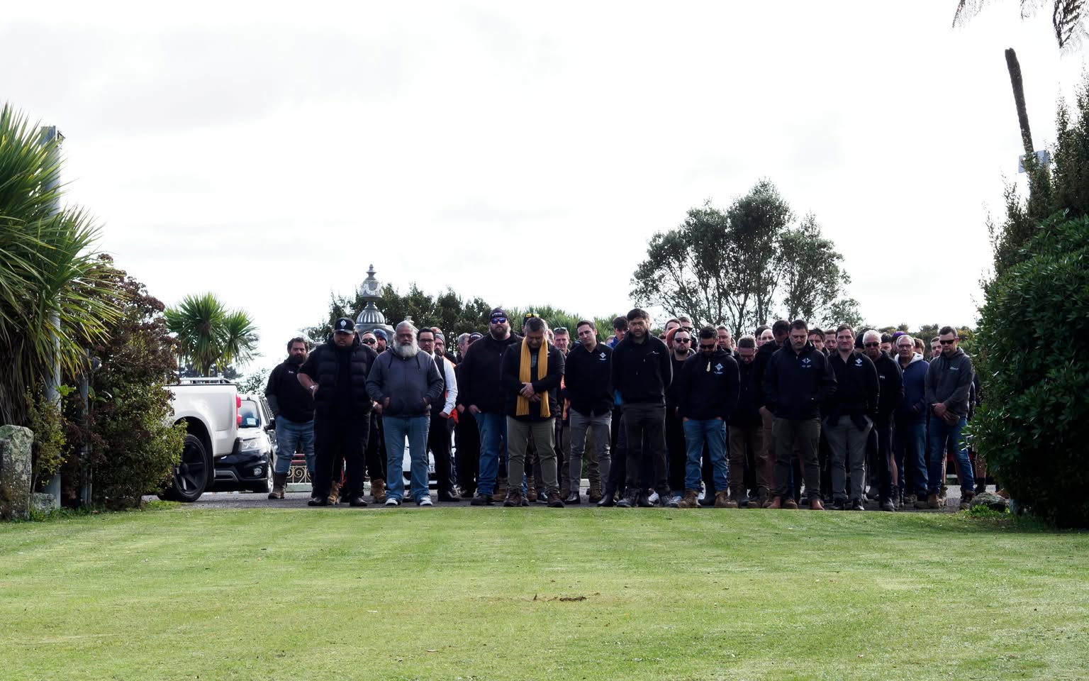nga-waka-whiria-powhiri-parihaka-taranaki Ngā Waka Whiria tradesmen standing at pōwhiri Parihaka Taranaki